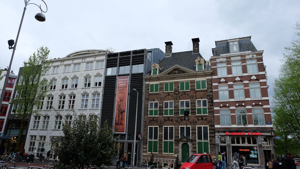 The Rembrandt House Museum on Jodenbreestraat in Amsterdam, the historic brick house beside the museum’s modern wing