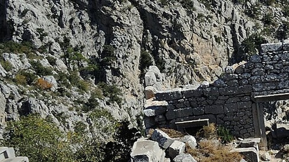 Stone ruins on steep mountain terrain at Termessos