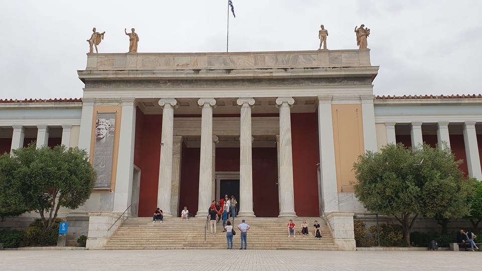 The neoclassical columned facade and entrance steps of the National Archaeological Museum of Athens