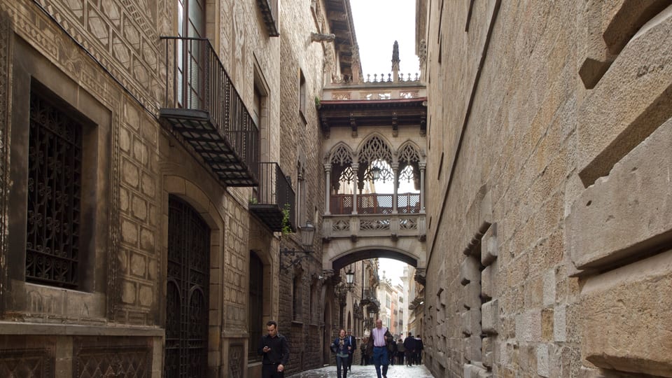 The carved stone bridge over Carrer del Bisbe in Barcelona's Gothic Quarter