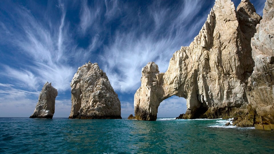 El Arco and the rocks of Land's End seen from the water