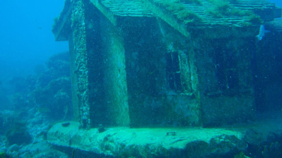 Submerged sculpture at the underwater museum near Cancún