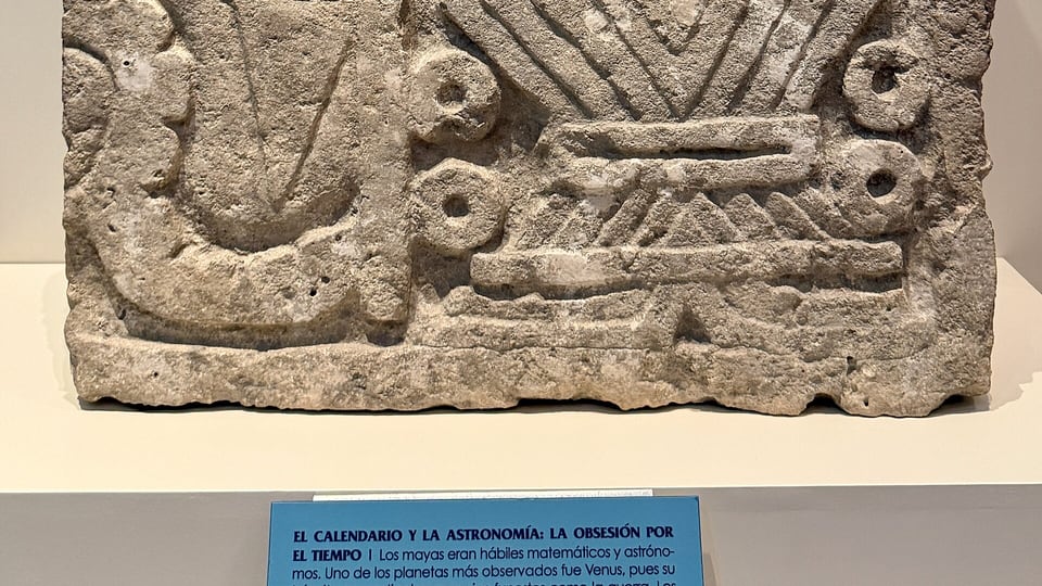 A carved Maya stone exhibit in Museo Maya de Cancún