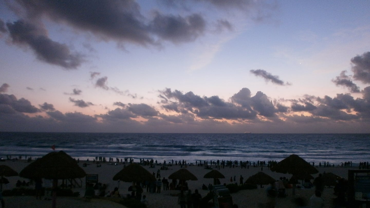 Public Playa Delfines shore at dusk in Cancún
