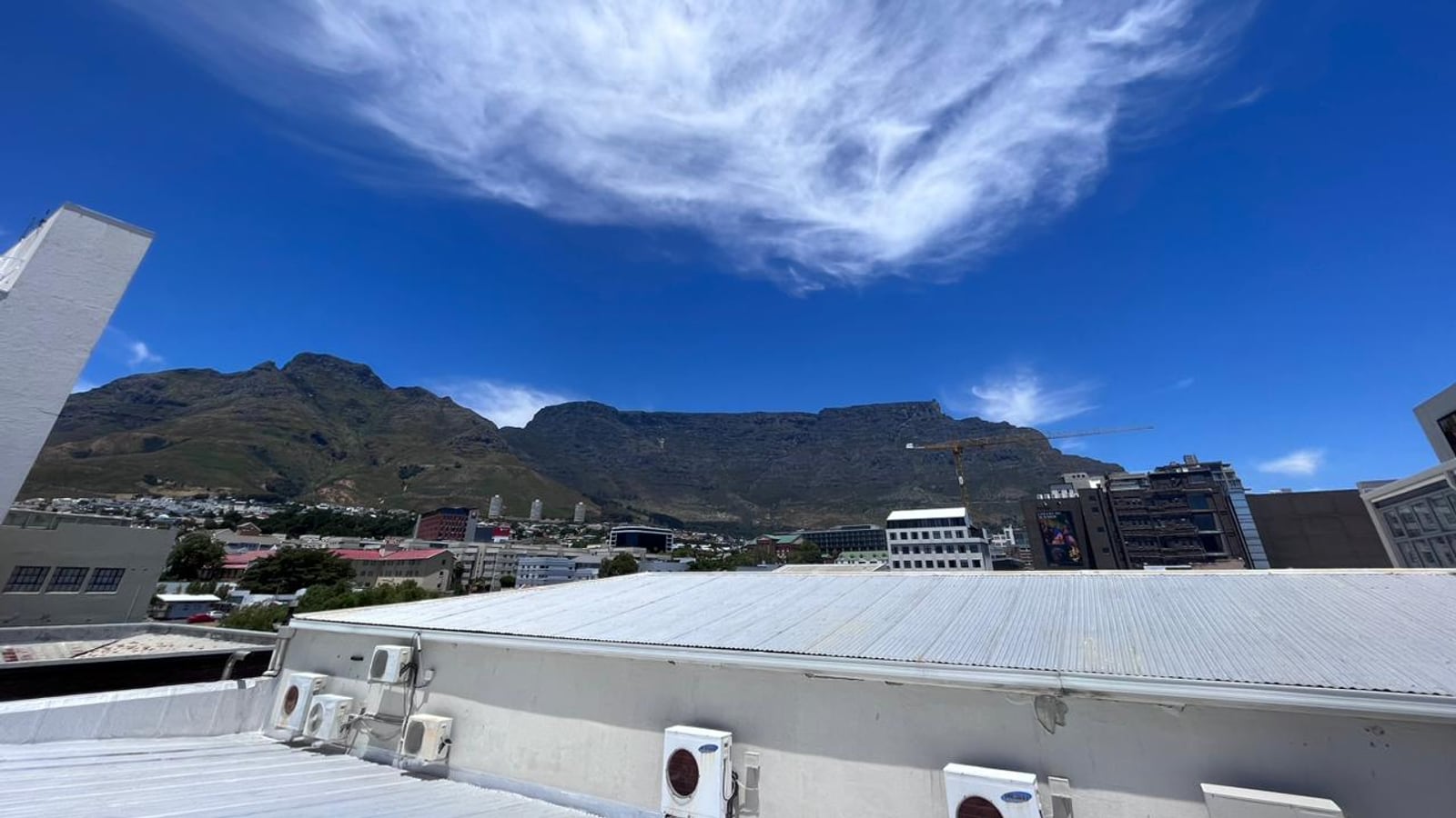 Table Mountain rising above Cape Town’s City Bowl and harbour