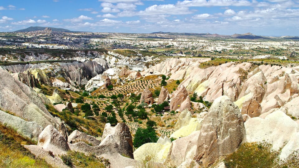 Rose Valley’s iron-rich tuff cliffs near sunset