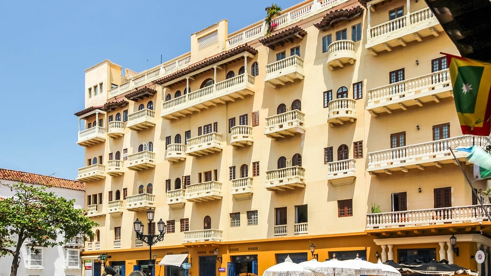 Balconied colonial buildings on the Plaza de Santo Domingo inside the walled city of Cartagena