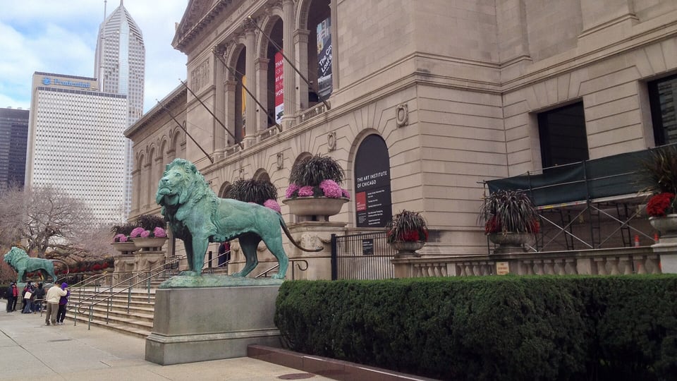 Art Institute of Chicago entrance on Michigan Avenue beside a bronze lion