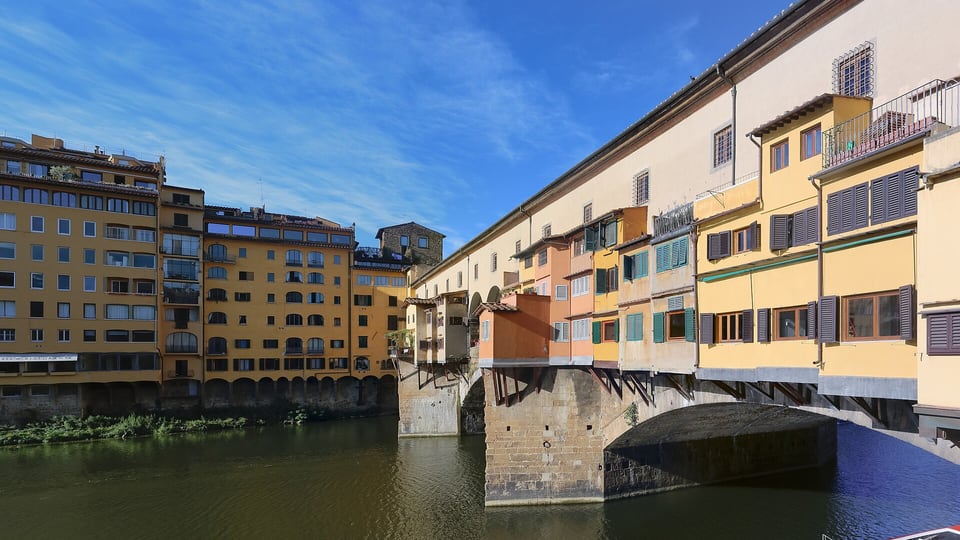 Ponte Vecchio from the north bank, with the shops and the Vasari Corridor above the arches