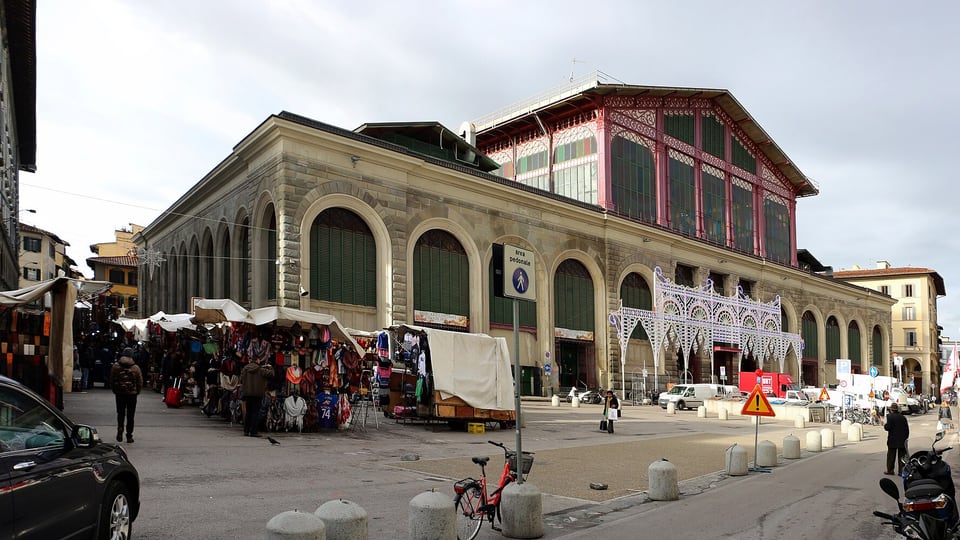 The iron and glass hall of the Mercato Centrale with street stalls in front