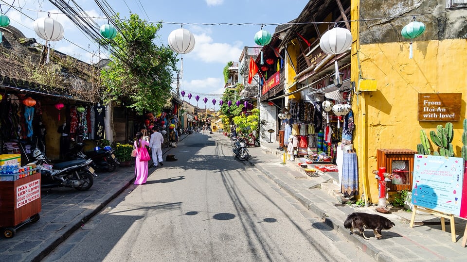 Tran Phu Street in Hoi An Ancient Town, lined with old shophouses and lanterns