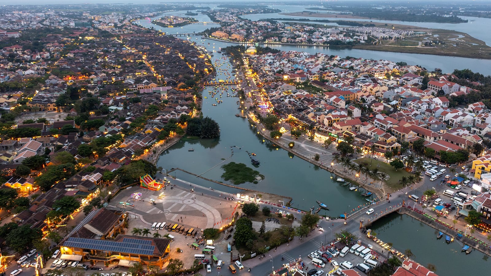 Hoi An old town and the Thu Bon River from above at dusk
