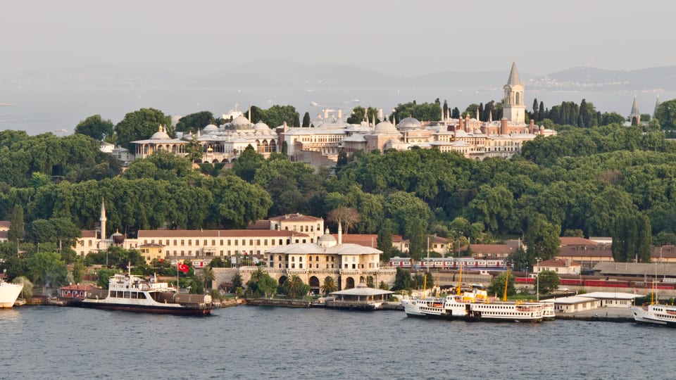 Topkapı Palace and its Tower of Justice on the wooded Seraglio Point above the water in Istanbul