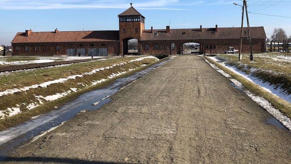 The main gatehouse and watchtower of the former Auschwitz-Birkenau camp, now the Auschwitz-Birkenau State Museum
