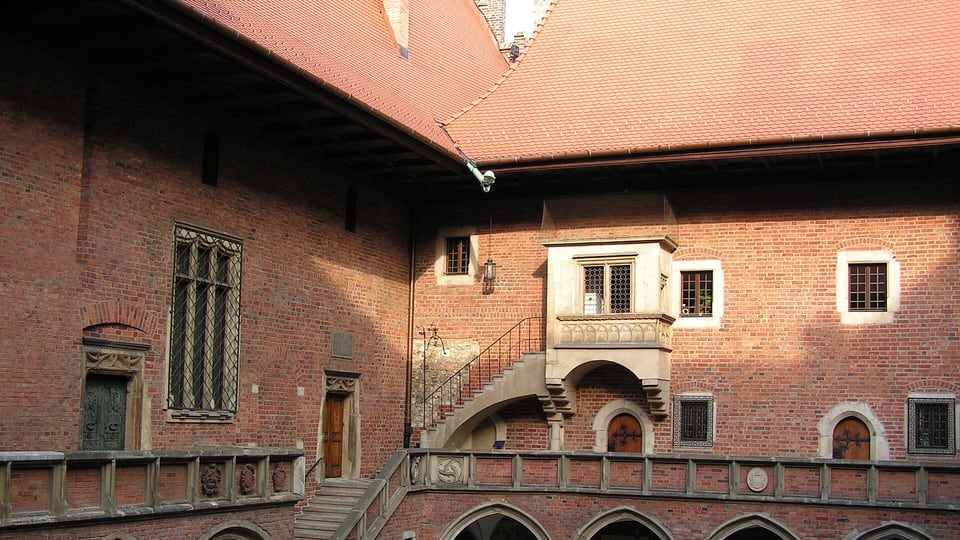 The arcaded Gothic courtyard of Collegium Maius, the oldest building of Jagiellonian University