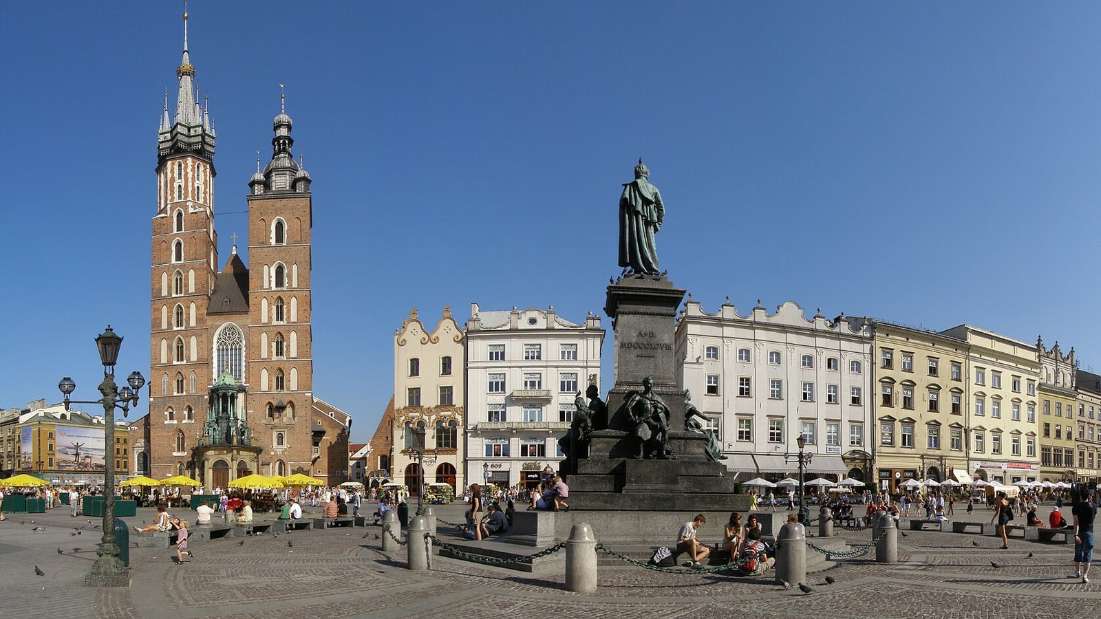Panoramic view of Rynek Główny, Kraków’s Main Market Square, with the Cloth Hall and St. Mary’s Basilica