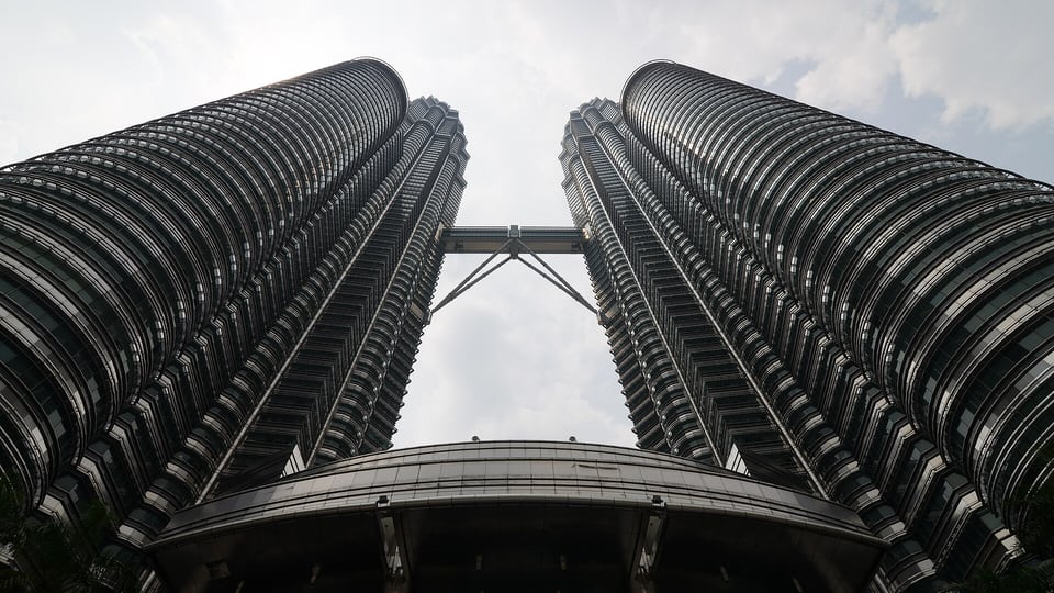 PETRONAS Twin Towers illuminated above Kuala Lumpur