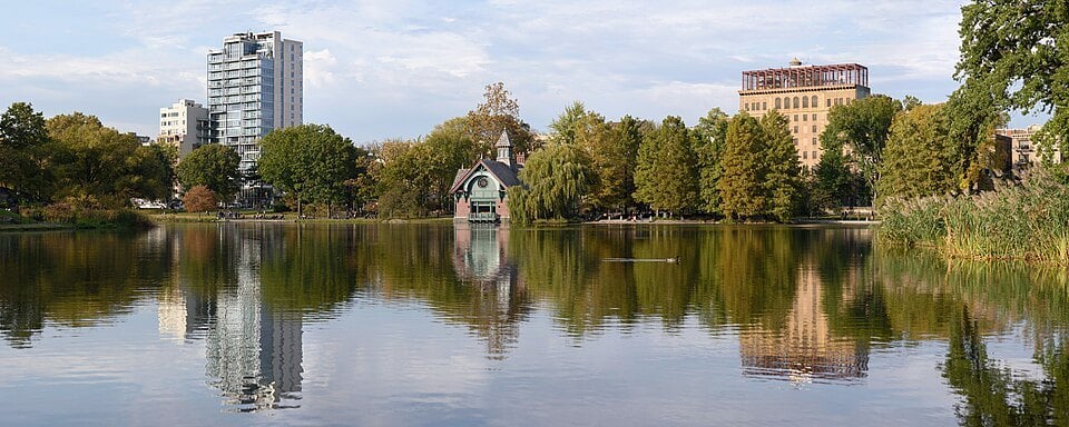 Central Park lake and the surrounding Manhattan skyline