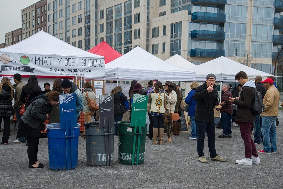 Food stalls and visitors at a Brooklyn Smorgasburg market