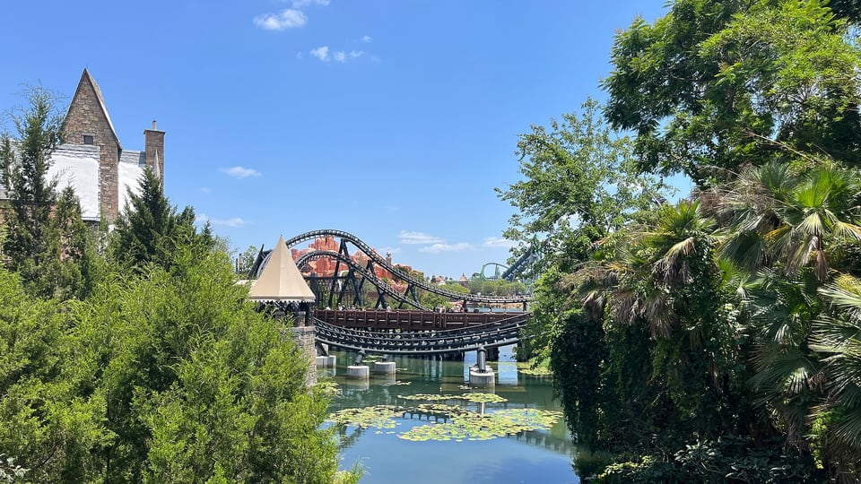 Lagoon and roller coaster inside Universal Islands of Adventure