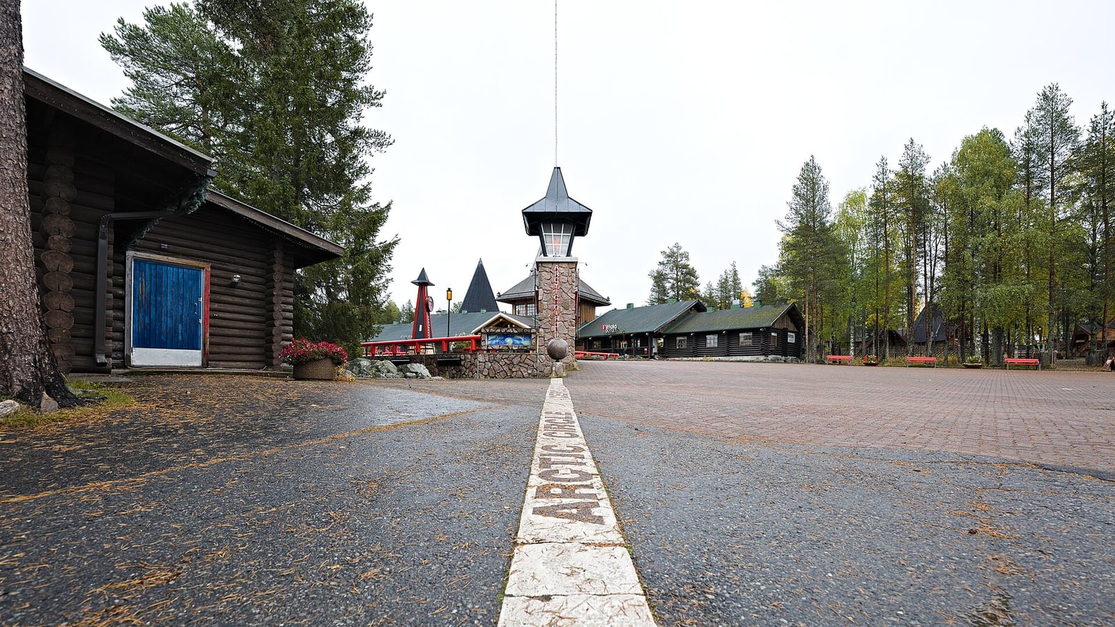The Arctic Circle marker at Santa Claus Village near Rovaniemi -- a practical tourist marker, not a laser-precise line
