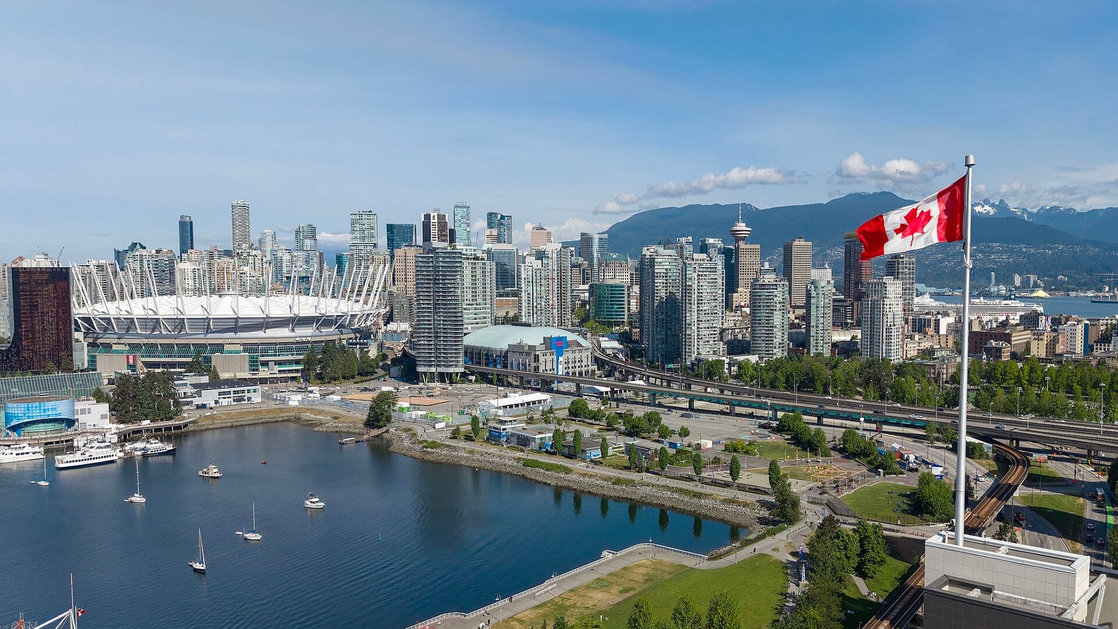 Downtown Vancouver with BC Place, False Creek and the North Shore Mountains