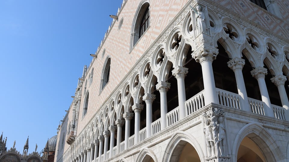 The lagoon-facing arcades and corner of the Doge’s Palace seen from the Molo