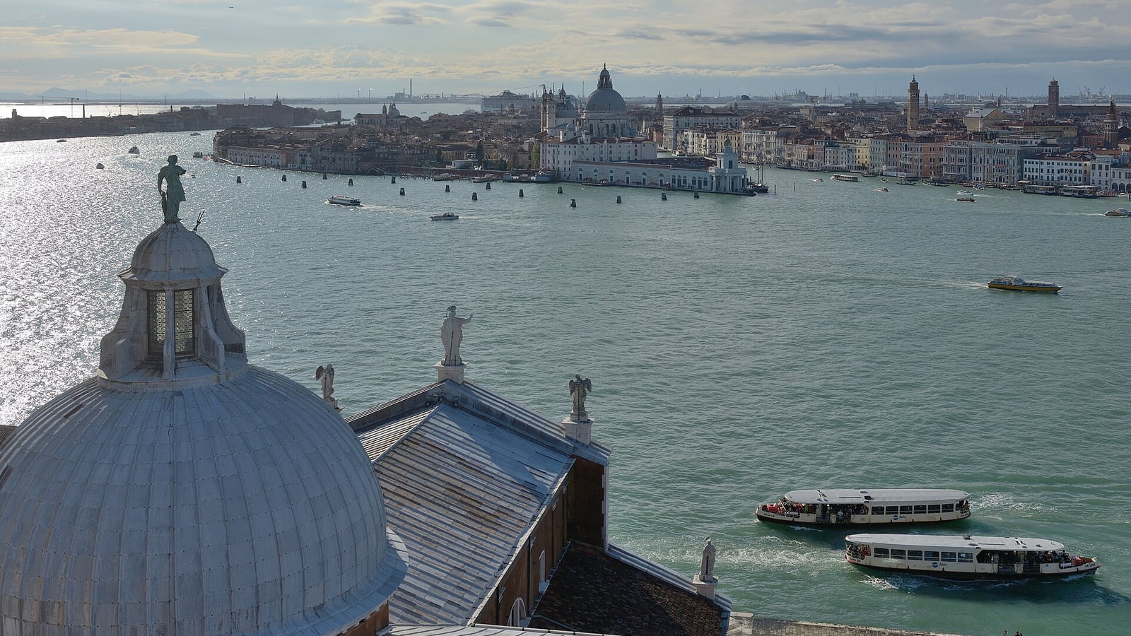 Water buses on the Giudecca Canal with the Dorsoduro waterfront beyond, seen from the bell tower of San Giorgio Maggiore